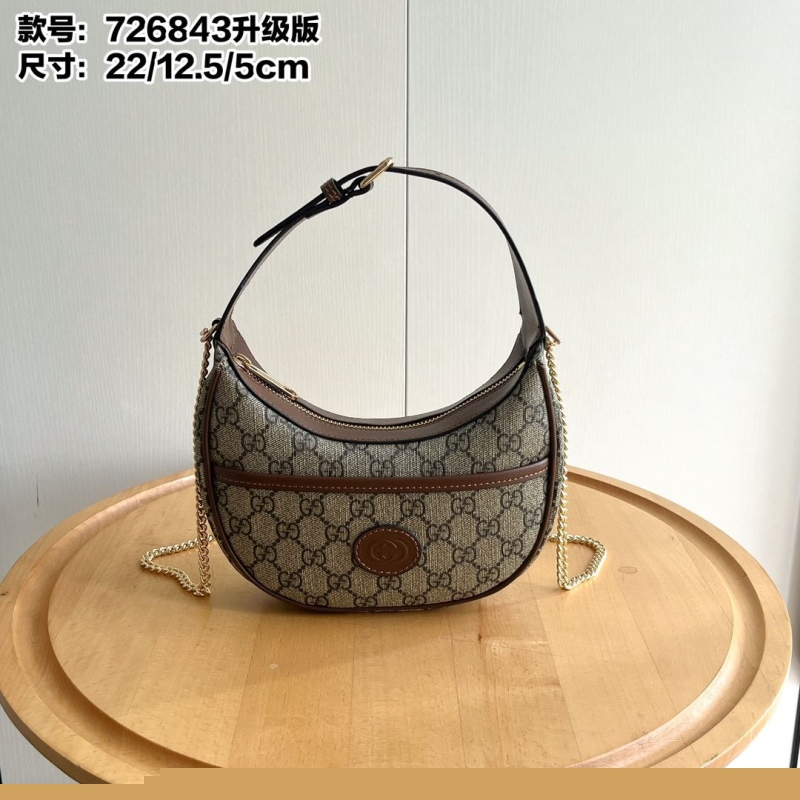 G*u*i top handle bags